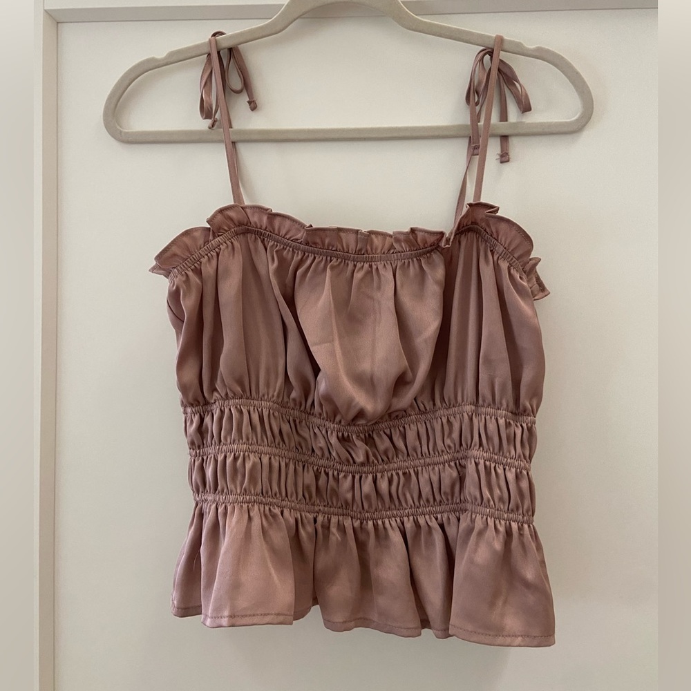 Pink spaghetti strap going out top